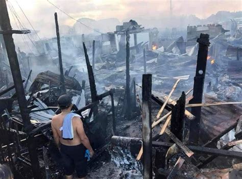 Fire razes hundreds of houses in GenSan .